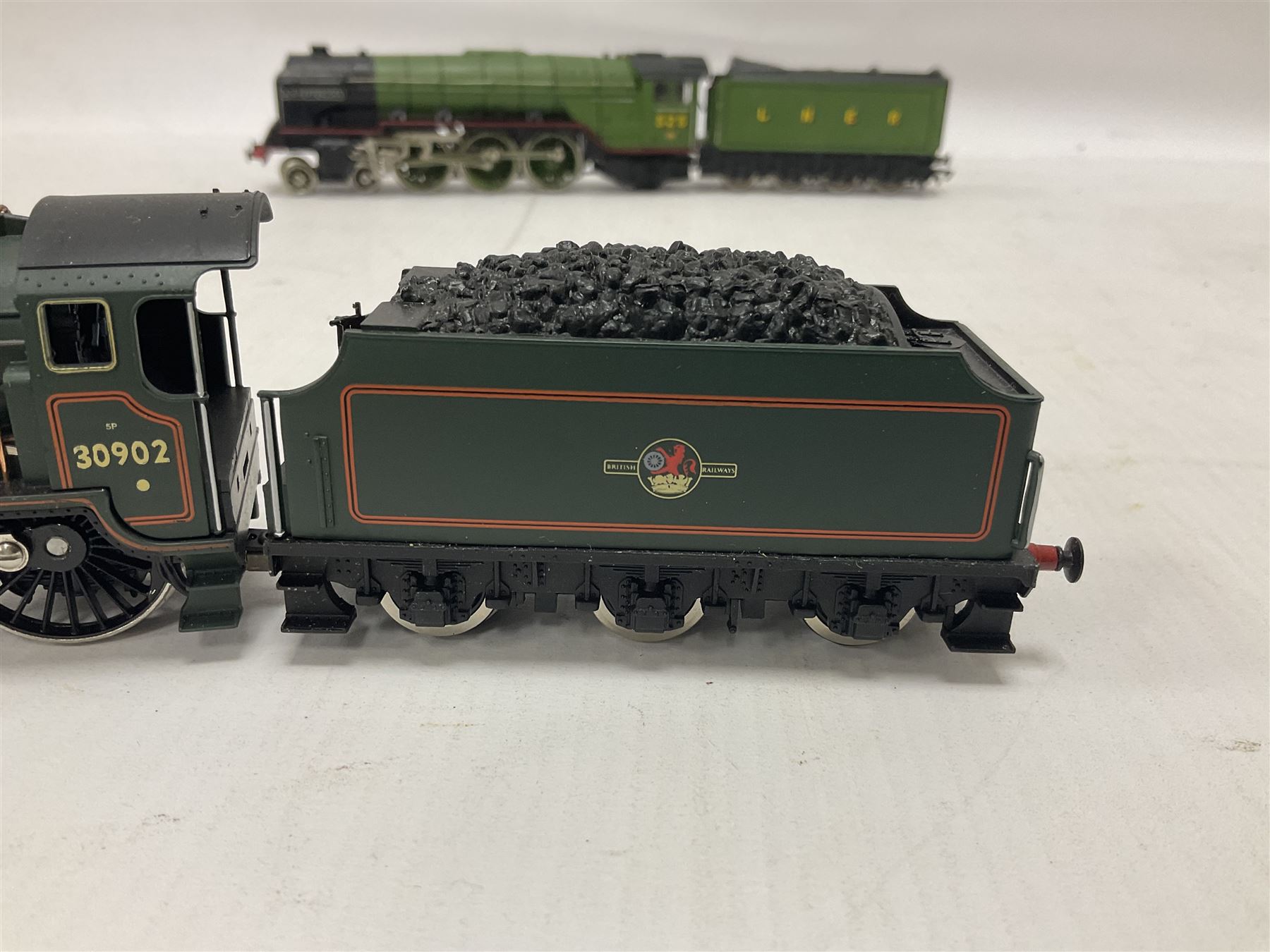Various makers ‘00’ gauge - Hornby Class D41/1 4-4-0 ‘Yorkshire’ locomotive no.62700 in BR black and Green Schools Class 4-4-0 ‘Wellington’ locomotive no.30902 in BR green; G&R Wrenn Class R1 Tank 0-6-0T locomotive no.1127 in green; Trix Trains Class A2 4-6-2 ‘A.H.Peppercorn’ locomotive no.525 in LNER green (4) 