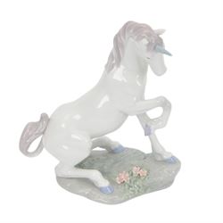 Three Lladro figures, comprising  Magical Unicorn no 7697, Prince of Elves no 7690 and Princess of the Fairies no 7694, all with original boxes 