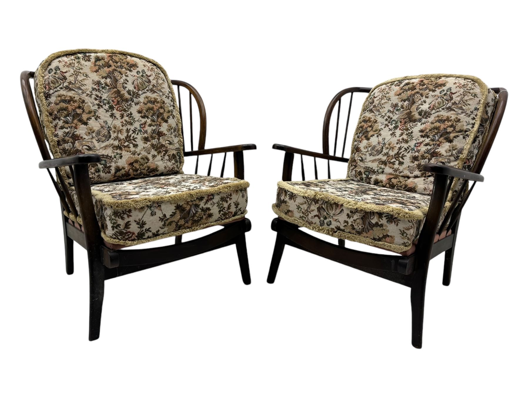 Joynson Holland - pair of mid-20th century stained beech framed easy chairs, shaped back and flat armrests over floral tapestry cushioned seat and back, on splayed supports united by stretcher