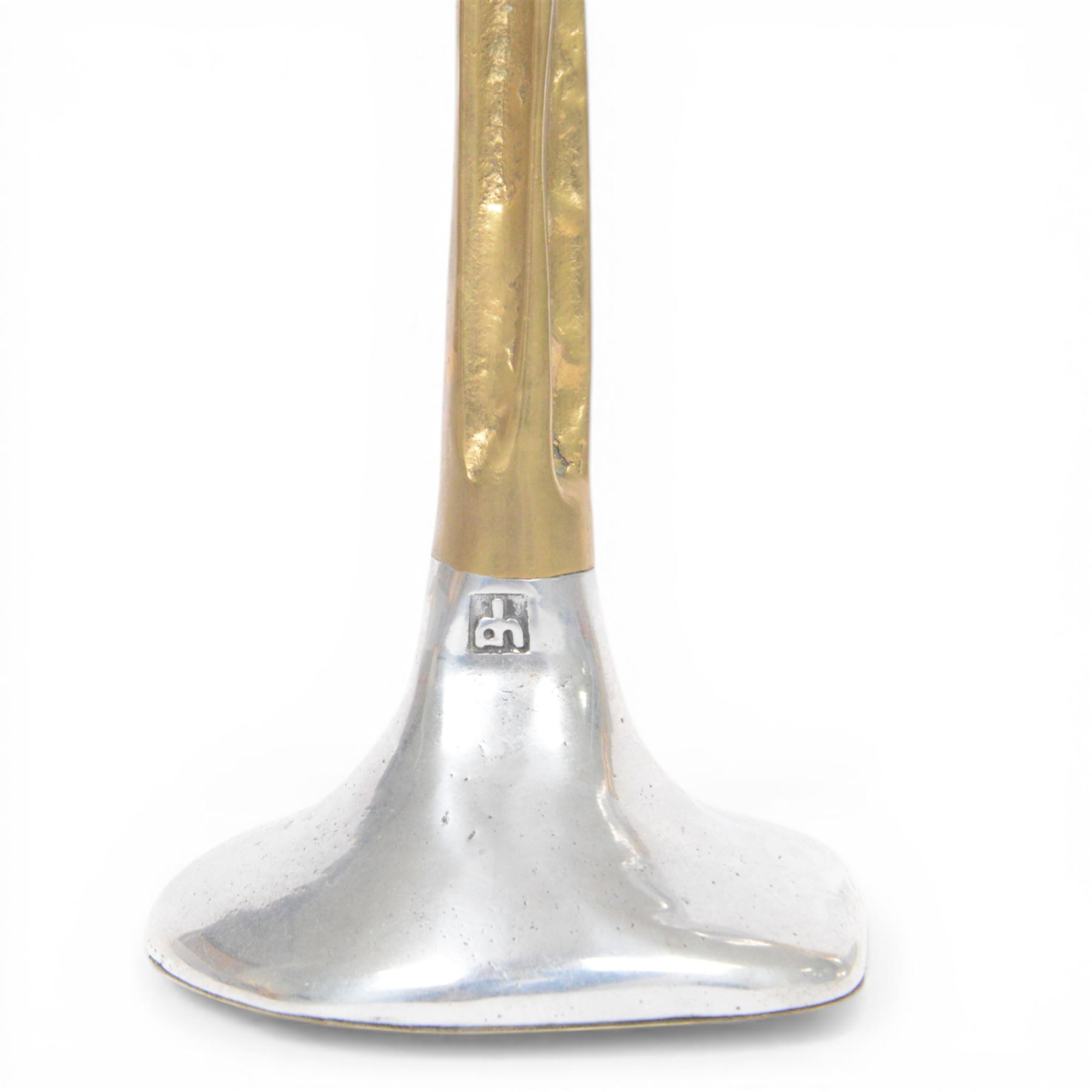 Set of David Marshall graduating candlesticks, brass and polished aluminium, makers mark impressed to stem, largest H26cm