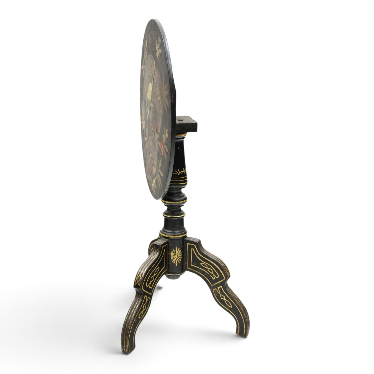 Late Victorian Aesthetic Movement ebonised and parcel-gilt lacquered occasional table, the circular tilt-top decorated in the Anglo-Japanese taste with motifs of fans, birds, insects and flowering branches, raised on a turned pedestal and tripod base shaped splayed supports