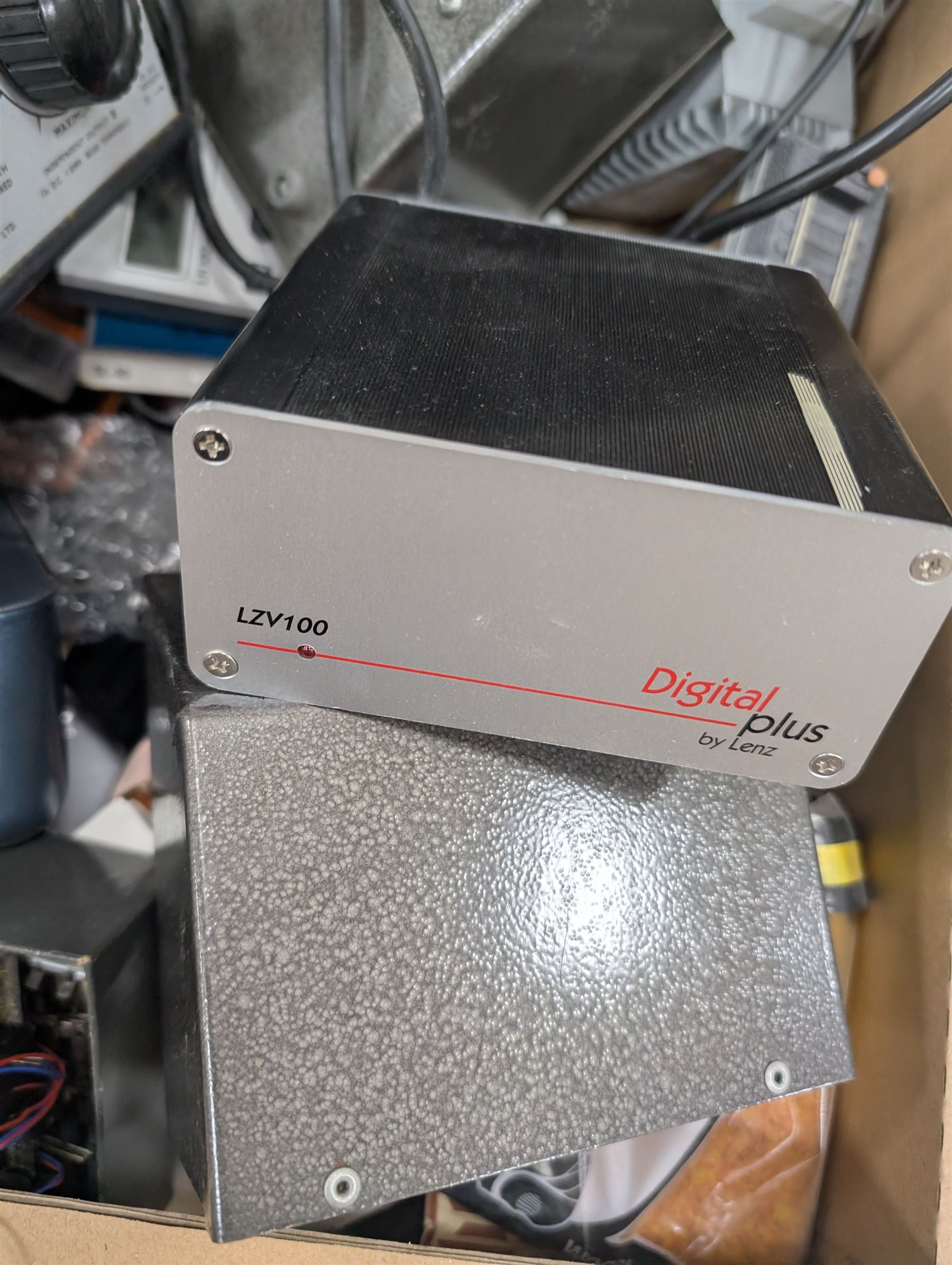 Collection of model railway control units, accessories and tools, including Lenz Digital Plus LZV100 with remote, H and M Electran Transistorised Power Unit, H and M Duette twin supply unit, motors, points, paints, Antex Soldering System, Flockit, etc, in three boxes