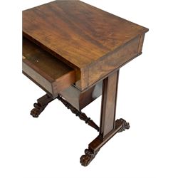 William IV figured mahogany work or sewing table, rectangular top over a single frieze drawer and sliding well, tapered end supports on rectangular platforms joined by turned stretcher, foliate carved paw feet with scroll and lobe carved tops, brass castors