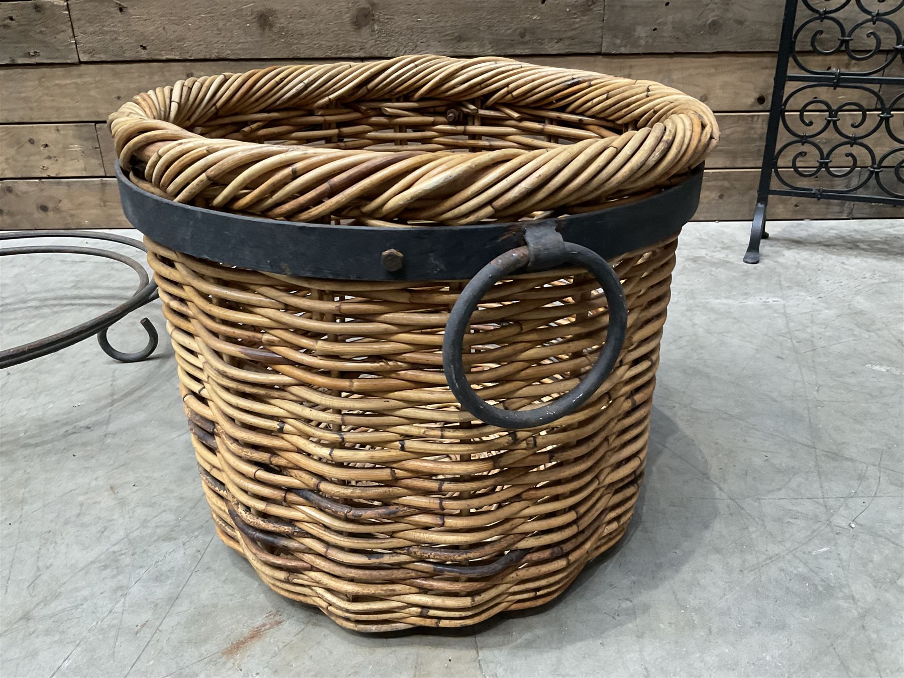Black painted wrought iron fire guard , wicker log basket with stand, coal bucket and a fire kerb (4)