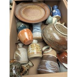 Collection of studio pottery, including bowls, vases, goblets and bottles, in four boxes 