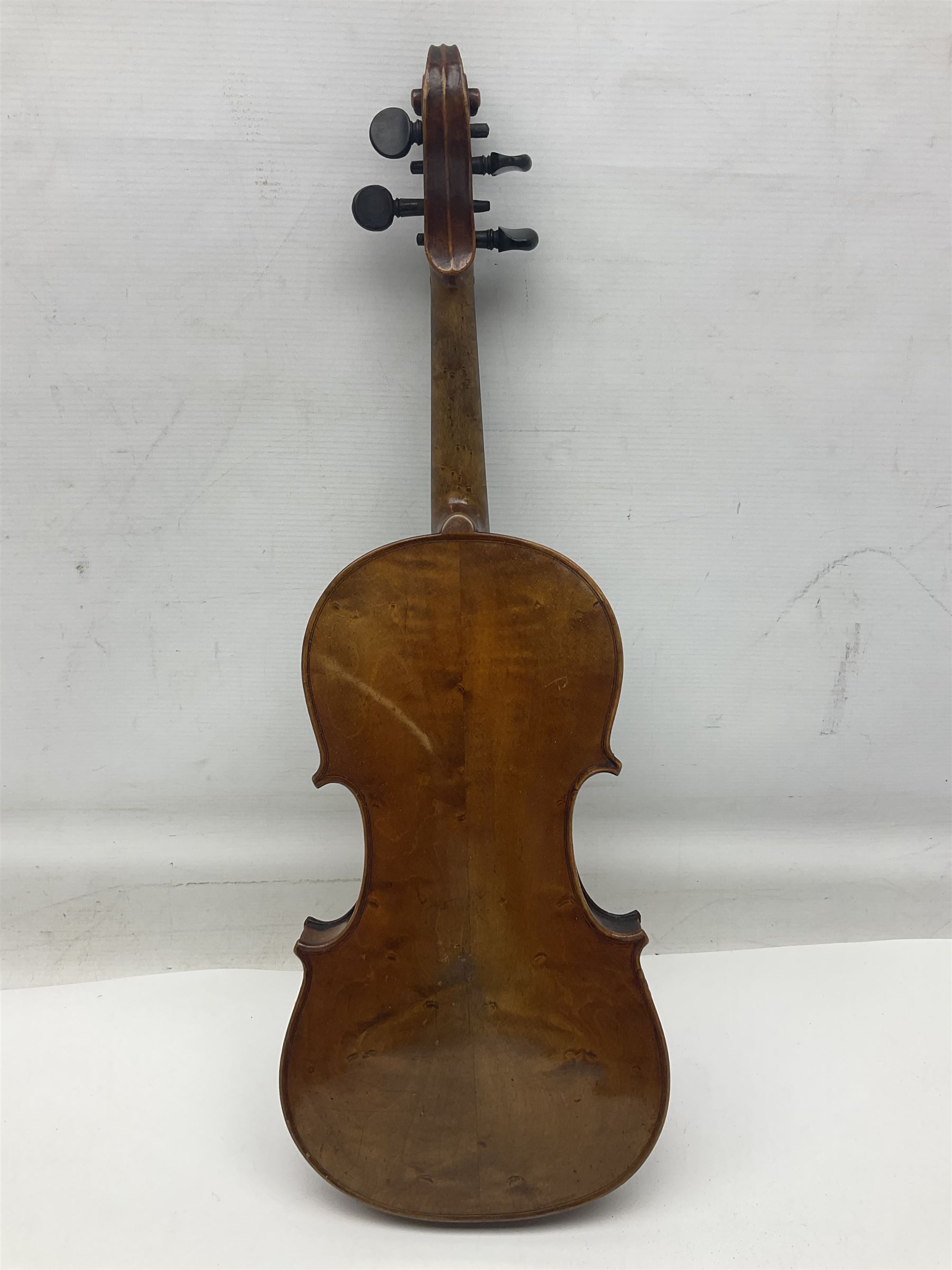 Late 19th century German trade violin c1890 with 36cm two-piece birds-eye maple back, neck and ribs and spruce top; bears label 'Manufactured in Berlin Special Copy of Nicolaus Amati' L59.5cm; in carrying case