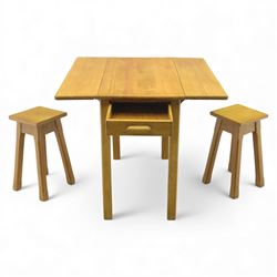 Late 20th century pine kitchen table and two stools, the rectangular drop-leaf table with straight legs, together with two square-topped stools 