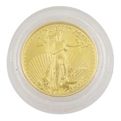 Two gold coin set comprising Queen Elizabeth II 1957 gold full sovereign coin and United States of America 2007 quarter ounce fine gold ten dollar coin, housed in a display case