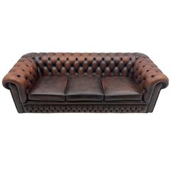 Chesterfield three seat sofa, upholstered in antique brown buttoned leather