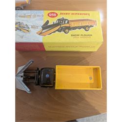 Three Dinky Toys diecast vehicles, comprising Field Marshall Tractor no. 301, Shell BP Fuel Tanker no. 944 and Snow Plough no. 958, all boxed