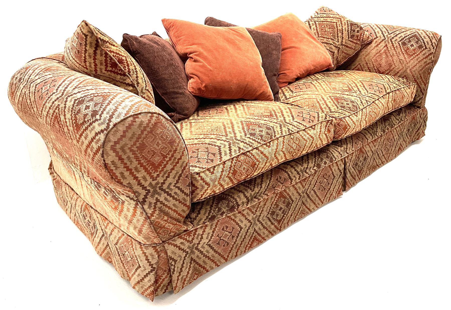 Tetrad kilim grand sofa, together with feather filled scatter cushions, pad supports The