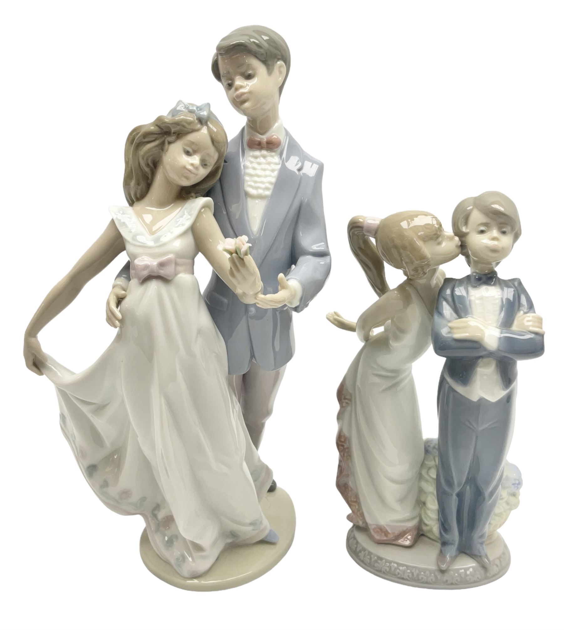 Two Lladro figures, comprising Now & Forever no 7642 and Kiss & Make Up no 5555, largest example H28cm