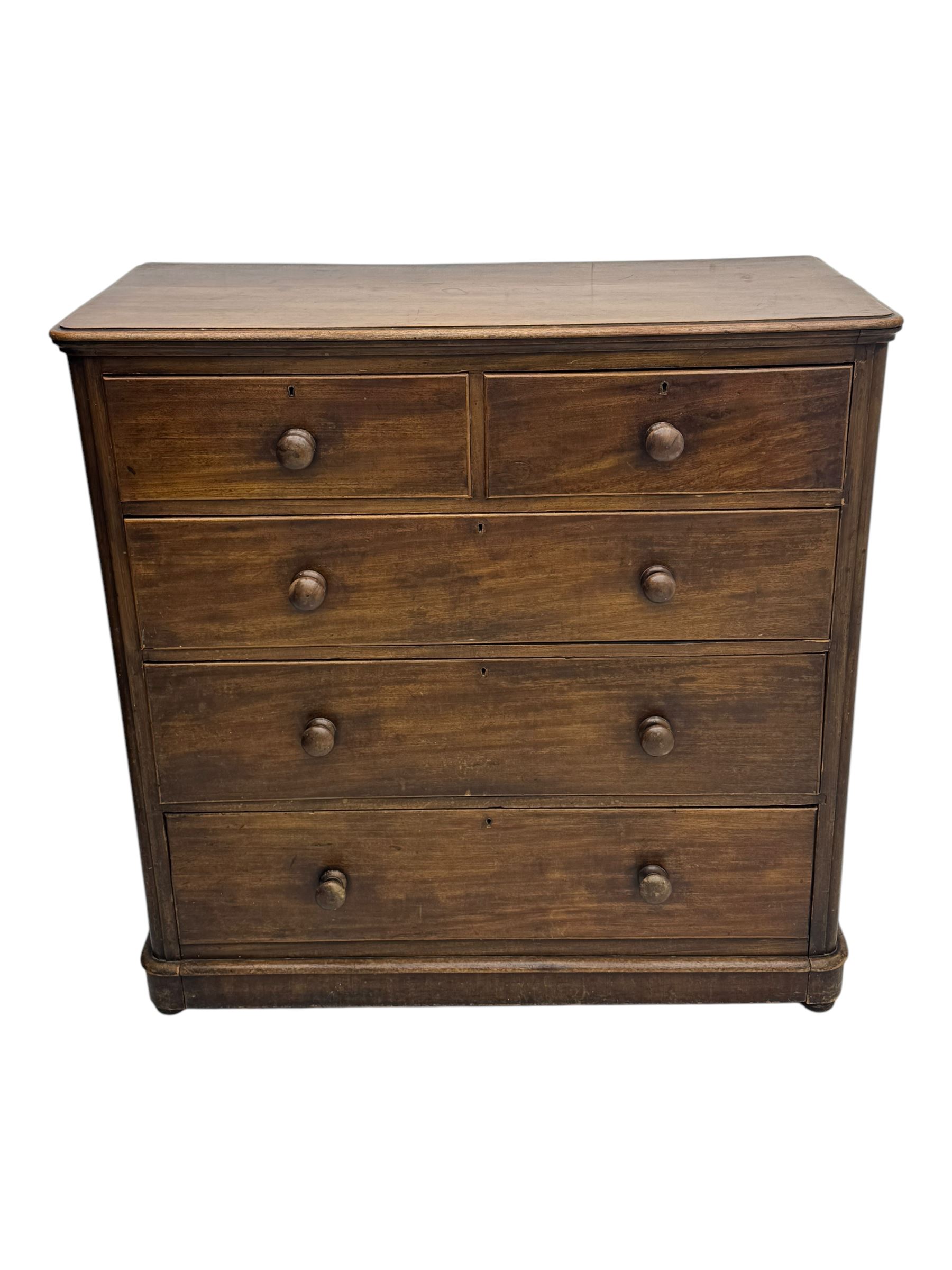 19th century mahogany chest of drawers, rectangular top over two short and three long graduated cockbeaded drawers, raised on compressed bun feet