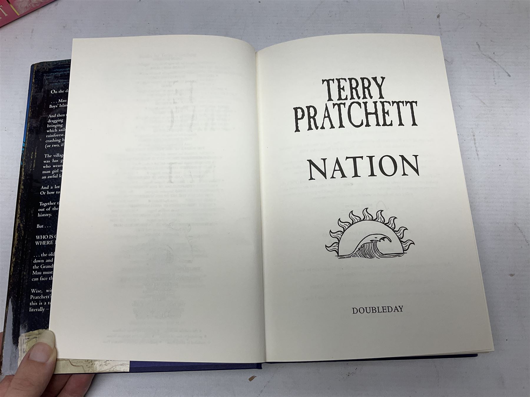 Collection of twenty-three hardback Terry Pratchett books, comprising approximately eighteen first editions including The Fifth Elephant signed & inscribed by Pratchett, all with dustjackets