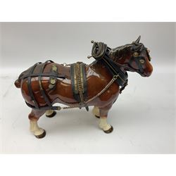Four Melba Ware Shire horse figures and another similar, and three wood carts
