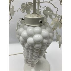Table lamp, scrolled branches entwined with vine leaves and a milk glass grape shade, H52cm