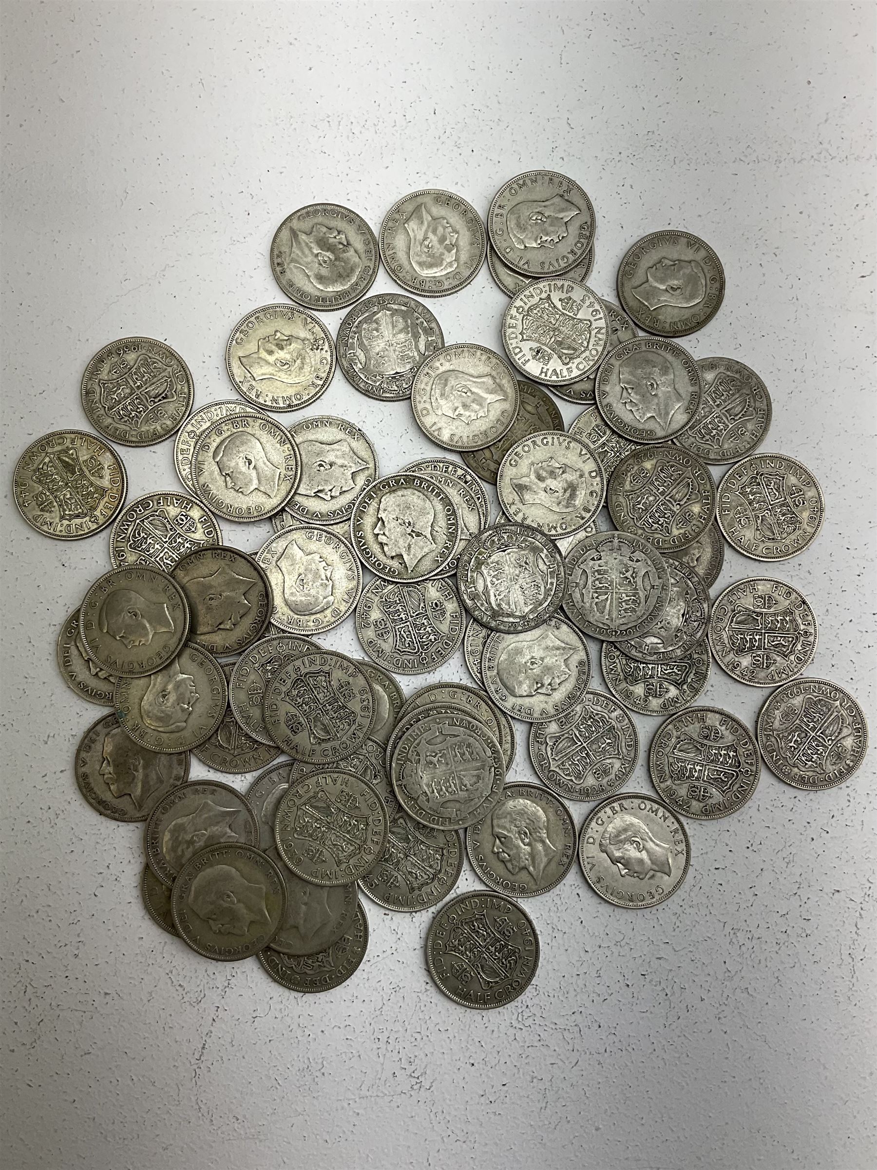 Approximately 975 grams of Great British pre 1947 silver half crown coins