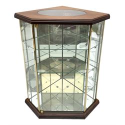 Swarovski Crystal Masquerade trilogy; 1999 Masquerade Pierrot, 2000 Columbine, 2001 Harlequin all with accompanying plaque, stand and original box, together with a glass display case with mirrored back and sides 