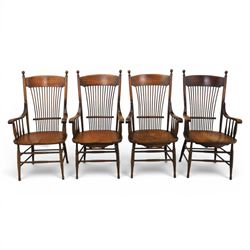 Set of eight 19th century ash and elm spindle back Windsor armchairs, arched top rails above fan-shaped spindle backs, curved arms with turned supports, shaped saddle seats, on turned legs joined by H-stretchers