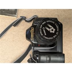 Canon T90 camera and a Kodak EK 160-EF camera