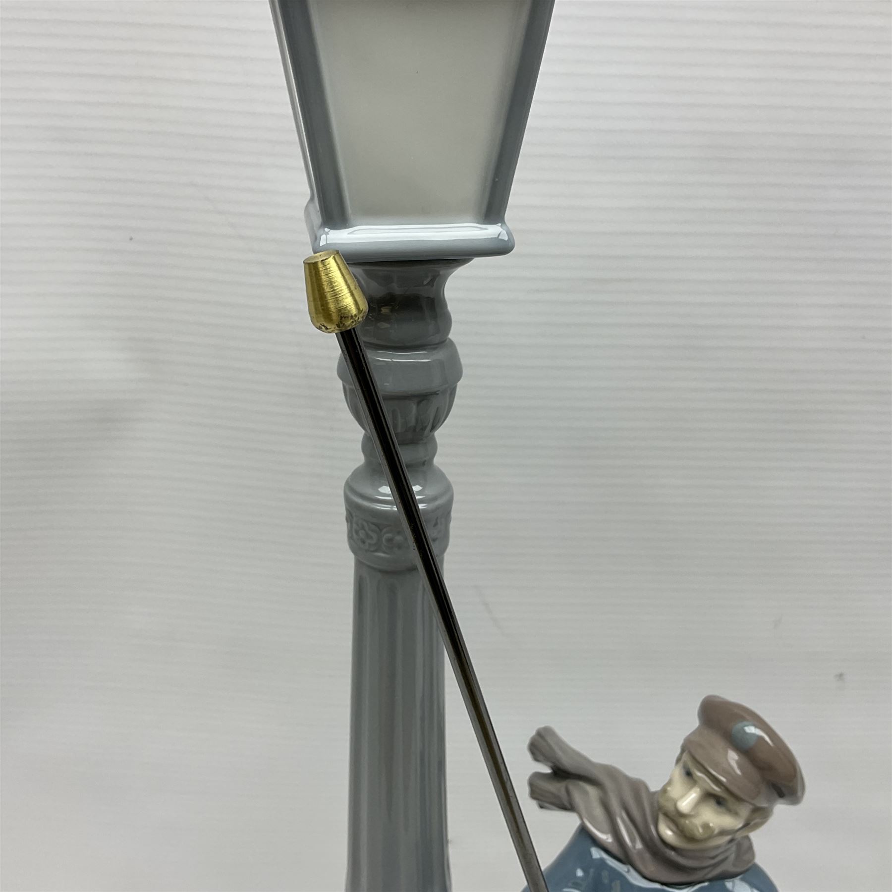 Five Lladro figures, including The Lamp Lighter no 5205,  Girl and Kittens no 6102, Cat no 5113 etc