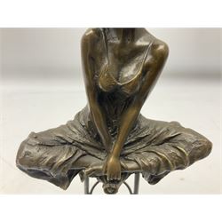Art Deco style bronze modelled as a female figure seating crossed legged upon a chair, after Pierre Collinet, H28cm