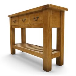 Contemporary golden ash and oak side table, rectangular top fitted with three drawers with swan-neck handles, on square supports united by slatted under-tier
