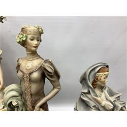 Four Giuseppe Armani figures, comprising The Flower-girl, Lady with Umbrella, Forget Me Not and Cedraschi  