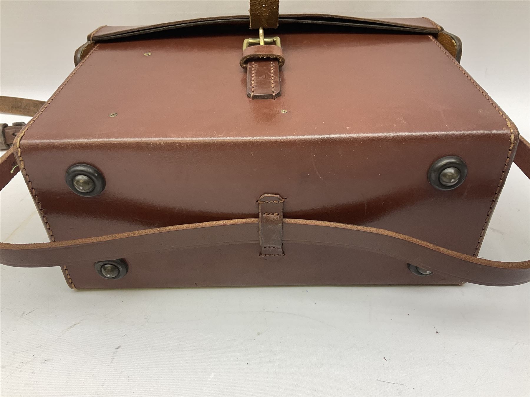 Post-WW2 stitched leather carrying case for an Exploder Dynamo-Condenser Mk.1 with baize lined fitted interior and carrying strap dated 1956 L28cm