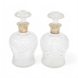 Pair of 1930s cut glass decanters, each with silver collars, hallmarked Mappin & Webb Ltd,...