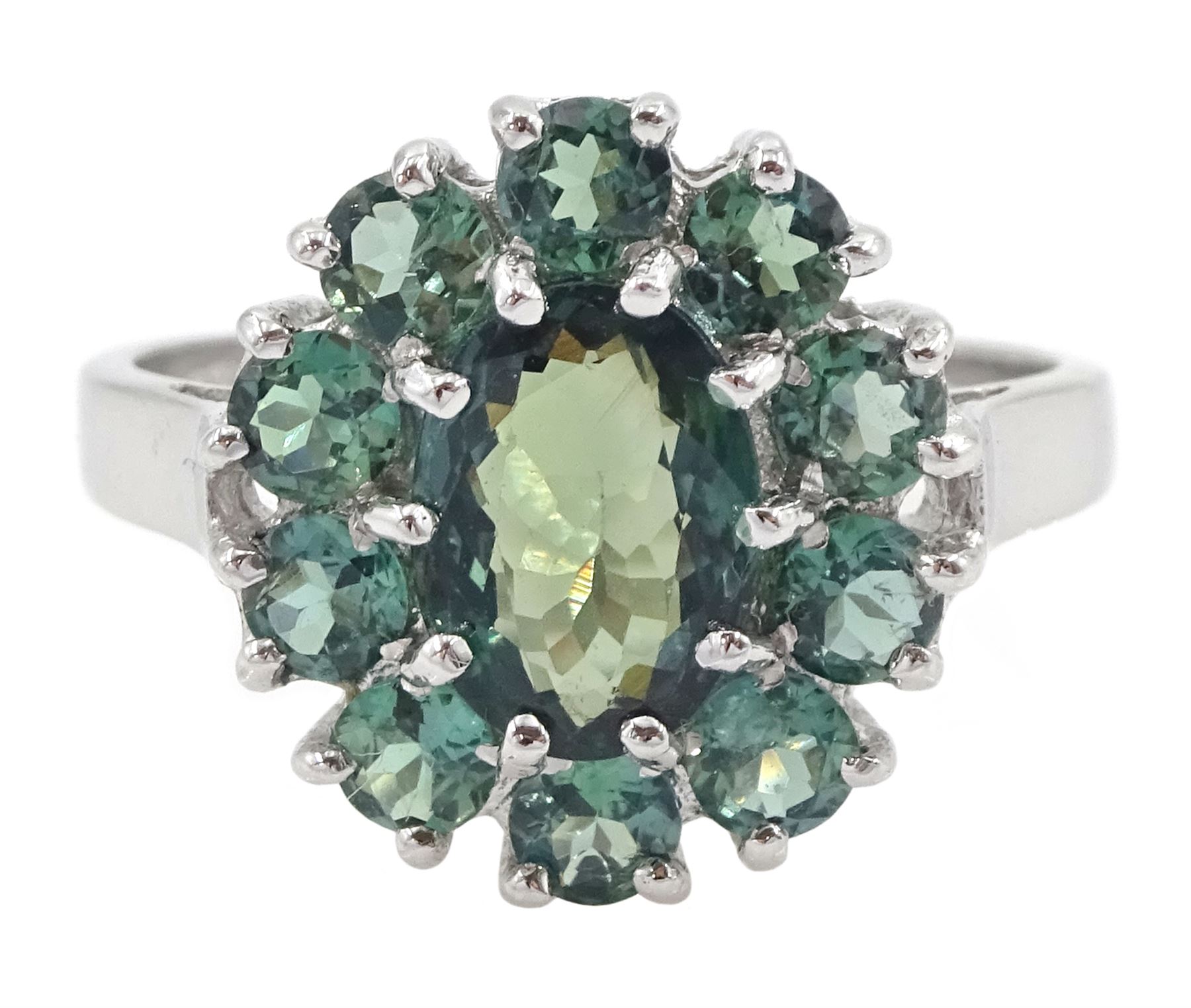 18ct white gold green sapphire cluster ring, oval cut sapphire of approx 1.40 carat, surrounded by ten round cut sapphires, Birmingham 2005, total sapphire weight approx 2.40 carat