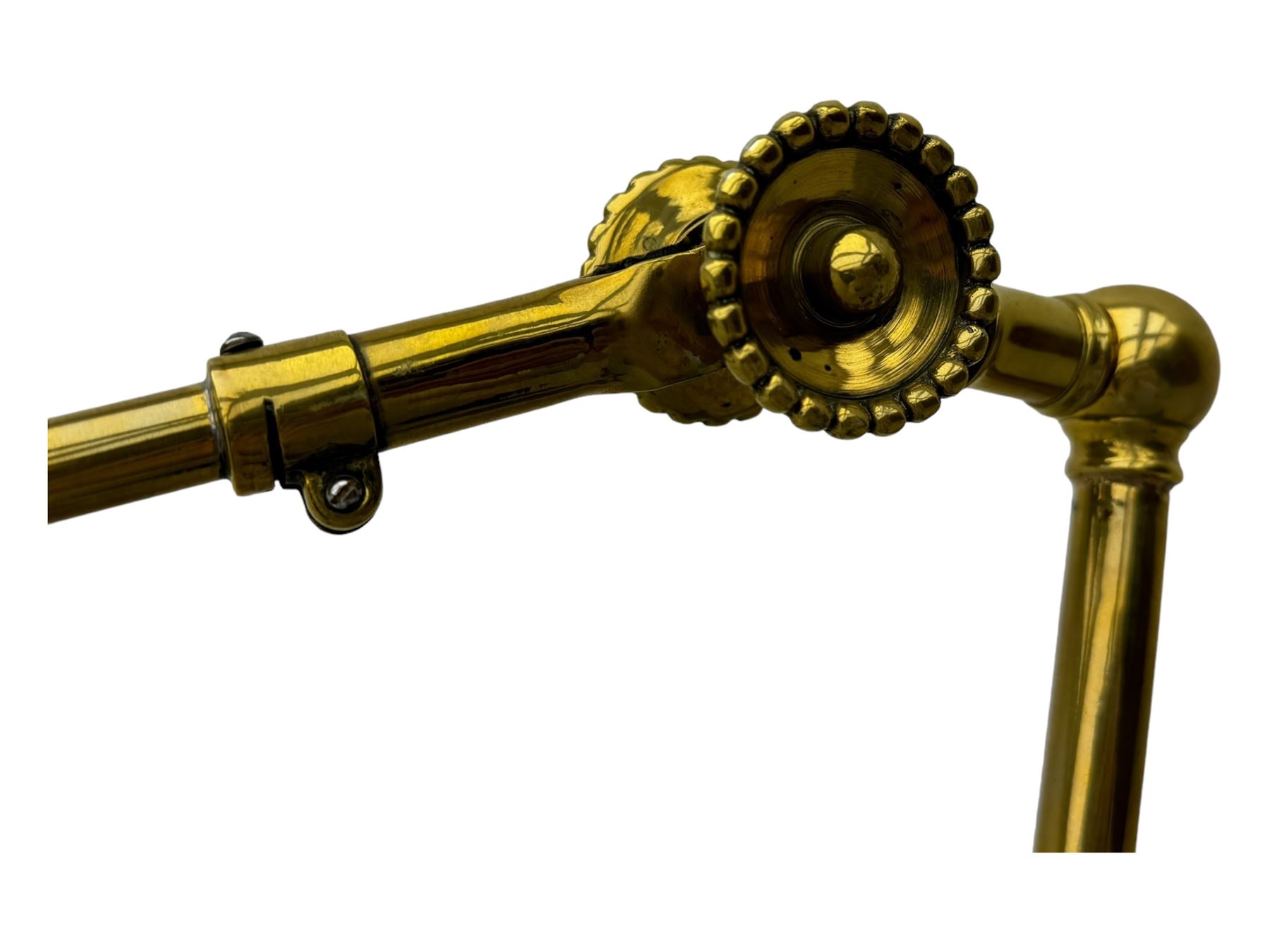 Early 20th century brass adjustable floor lamp, Royal Doulton decorative ceramic base embellished with raised floral and scroll patterns, stamped, brass column and adjustable arms terminating in brass bulb holder