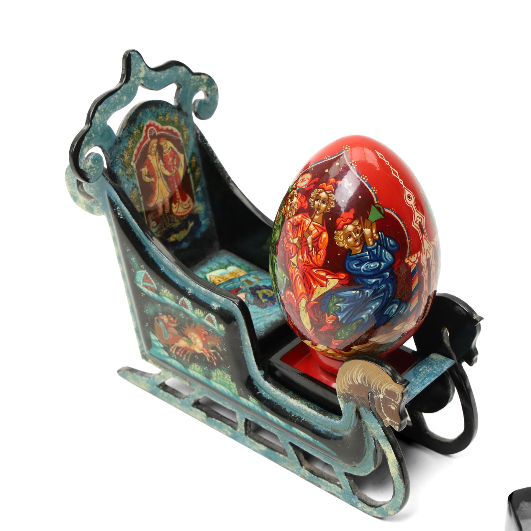 Modern  Russian lacquer box decorated with a Winter landscape, another in the form of a Troika, another lacquer box and a lacquer egg.