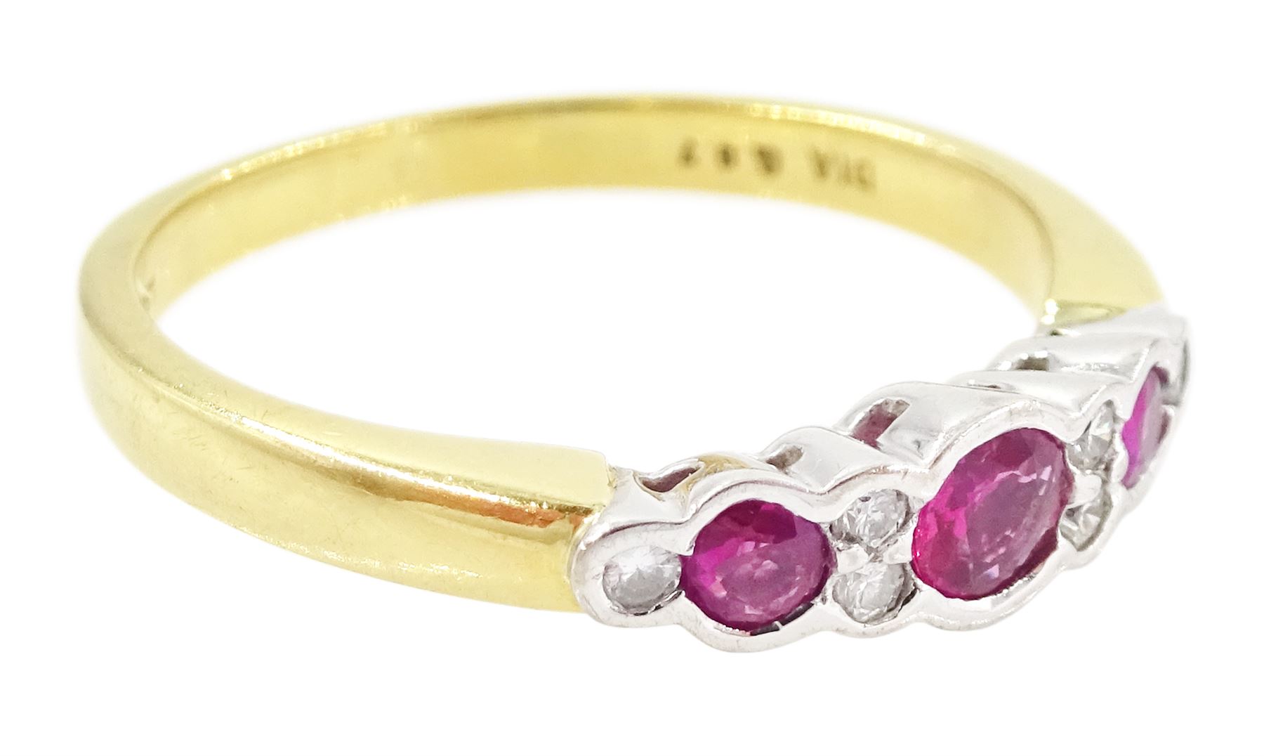 18ct gold ruby and diamond ring, three round cut rubies, with round brilliant cut diamonds set between, London import mark 1995, total diamond weight 0.07 carat, total ruby weight approx 0.70 carat