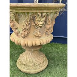 Pair composite stone garden planters, decorated with floral swags and grotesque masks, gadrooned underside - THIS LOT IS TO BE COLLECTED BY APPOINTMENT FROM DUGGLEBY STORAGE, GREAT HILL, EASTFIELD, SCARBOROUGH, YO11 3TX