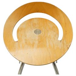 Lyra - set of three bar stools, dished plywood seats with wraparound low backs and crescent apertures, on outward swept chrome supports with contrasting black footrests
