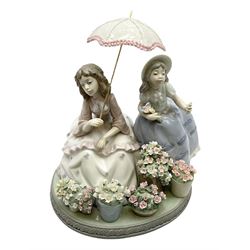 Lladro figural group Flowers for Sale, modelled as a group of girls selling flowers under a parasol, no. 5537, H20cm