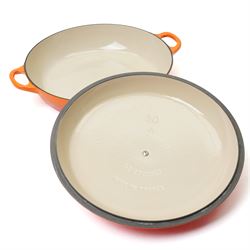 Le Creuset oval casserole dish and cover,  and another shallow example, in the Volcanic colourway