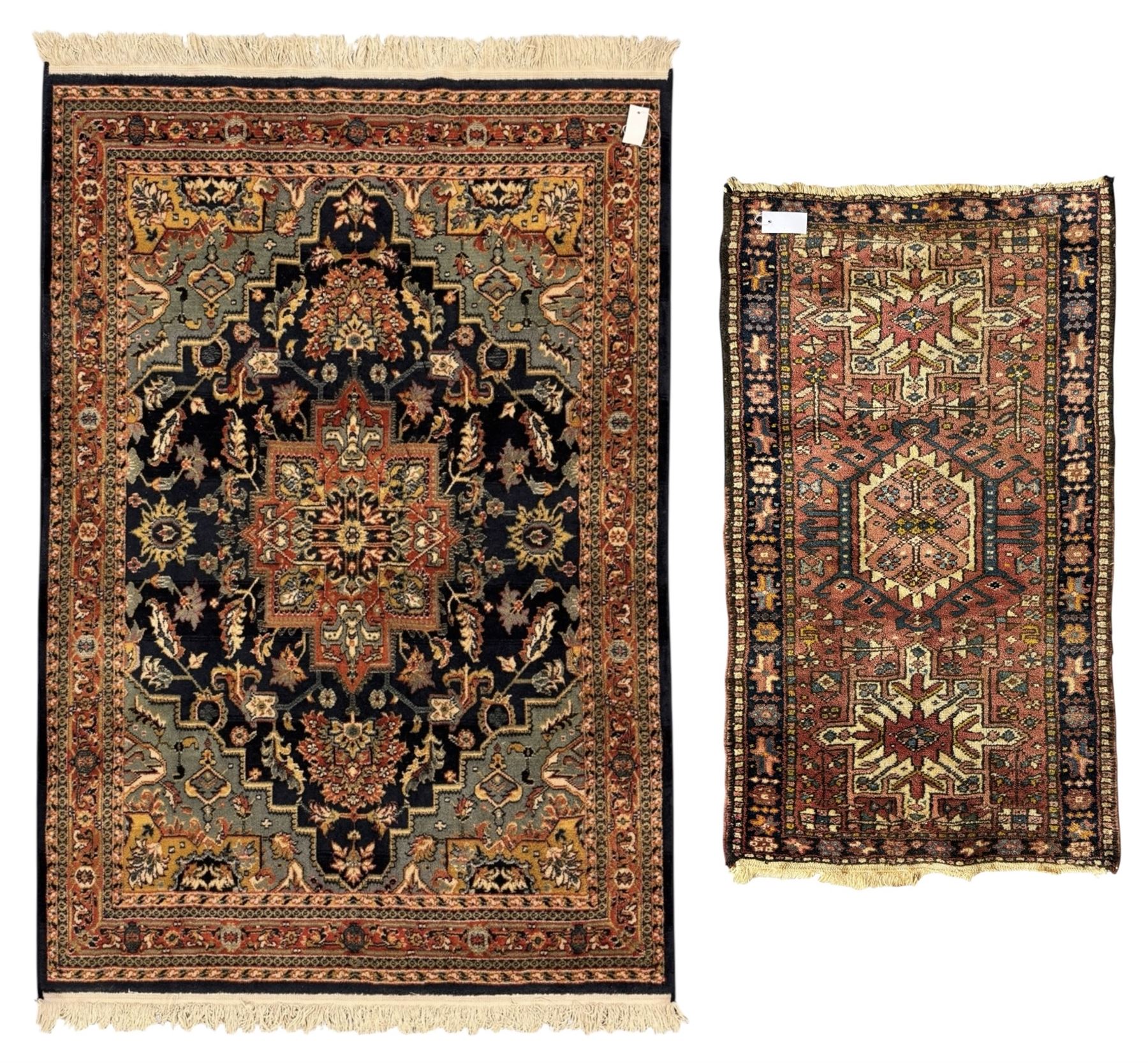 Belgian Sultan woollen ground rug, central navy field densely decorated with floral sprays and geometric patterns (192cm x 135cm); handwoven tribal terracotta ground rug (121cm x 71cm); Persian crimson ground runner, all over stylised floral and foliate motifs (266cm x 94cm)