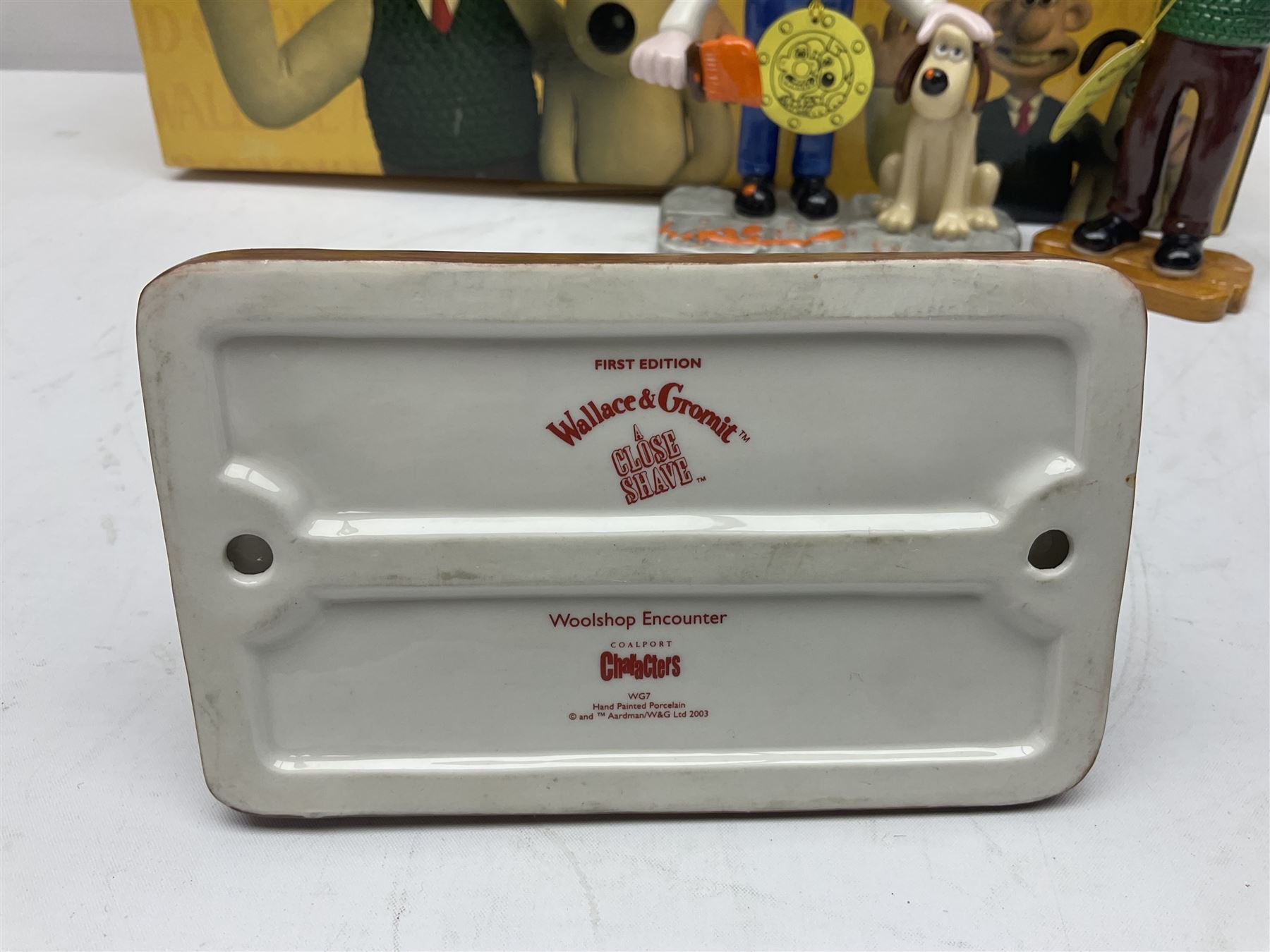 Six Coalport Characters Wallace and Gromit figures, comprising Ready for Takeoff, Woolshop Encounter, Do Something Gromit, Shaun's New Coat, More Cheese Gromit and Happy Birthday Gromit, two with original boxes 