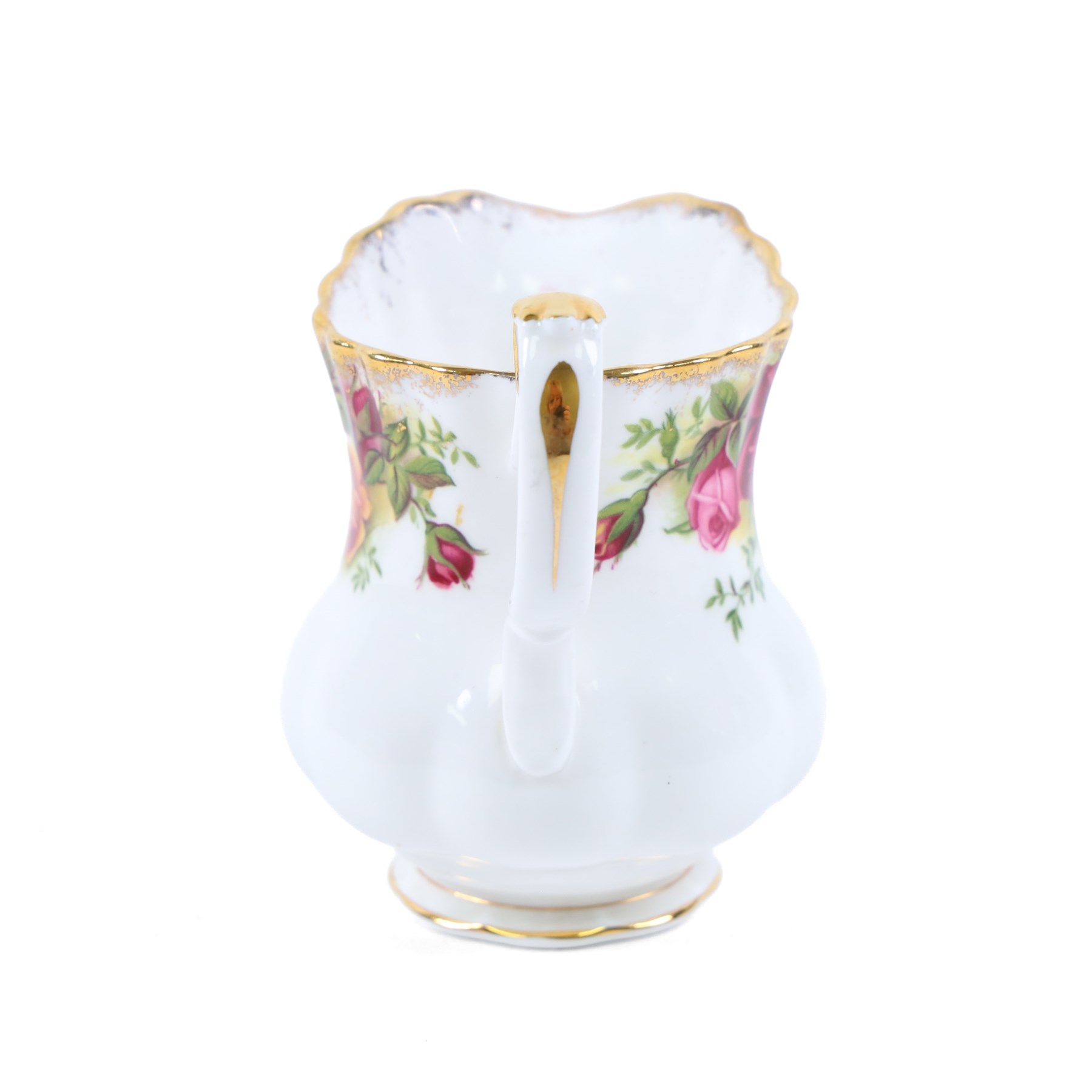 Royal Albert Old Country Roses tea set, comprising cake stand, milk jug, seven dessert plates, seven cups and ten saucers 