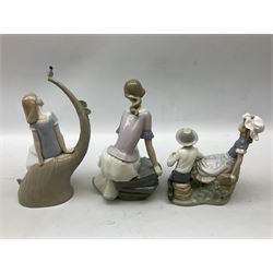 Three Nao figures, comprising 'Lazy Afternoon' no. 1523, 'Bandaging the Foot' no. 448 and 'Spring Reflections' no. 1392, tallest H32cm