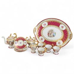 Vienna porcelain cabaret service for four, comprising tray, teapot, covered sucrier, milk jug, cups and saucers 