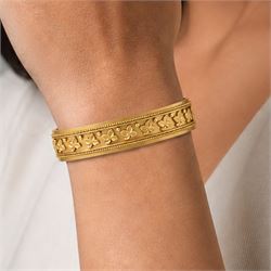 19th / early 20th century gold hinged bangle, with applied ivy leaf, bead and wirework decoration