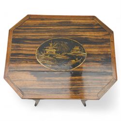 Edwardian coromandel wood work or sewing table, canted rectangular form, the hinged lid with central chinoiserie panel depicting traditional scene with boat, enclosing sunken storage well with pleated skirt, on square tapering supports with splayed feet united by curved stretchers 