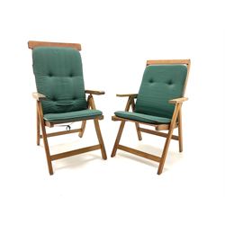 A pair of hardwood folding garden chairs, together with removable cushions 