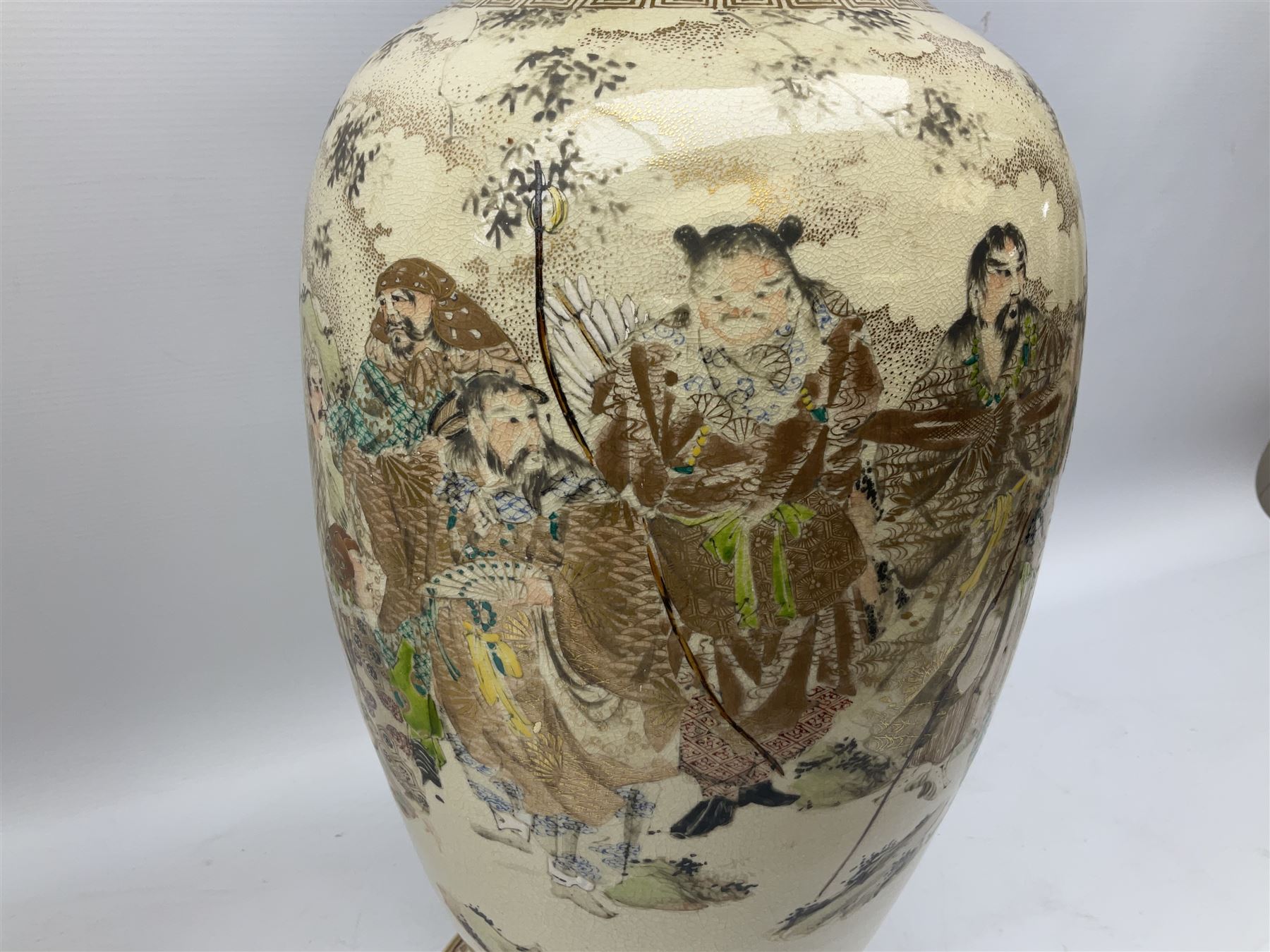 Pair early 20th Century Japanese floor vases of ovoid form, painted with warriors and elders within geometric designs and gilding, H61cm