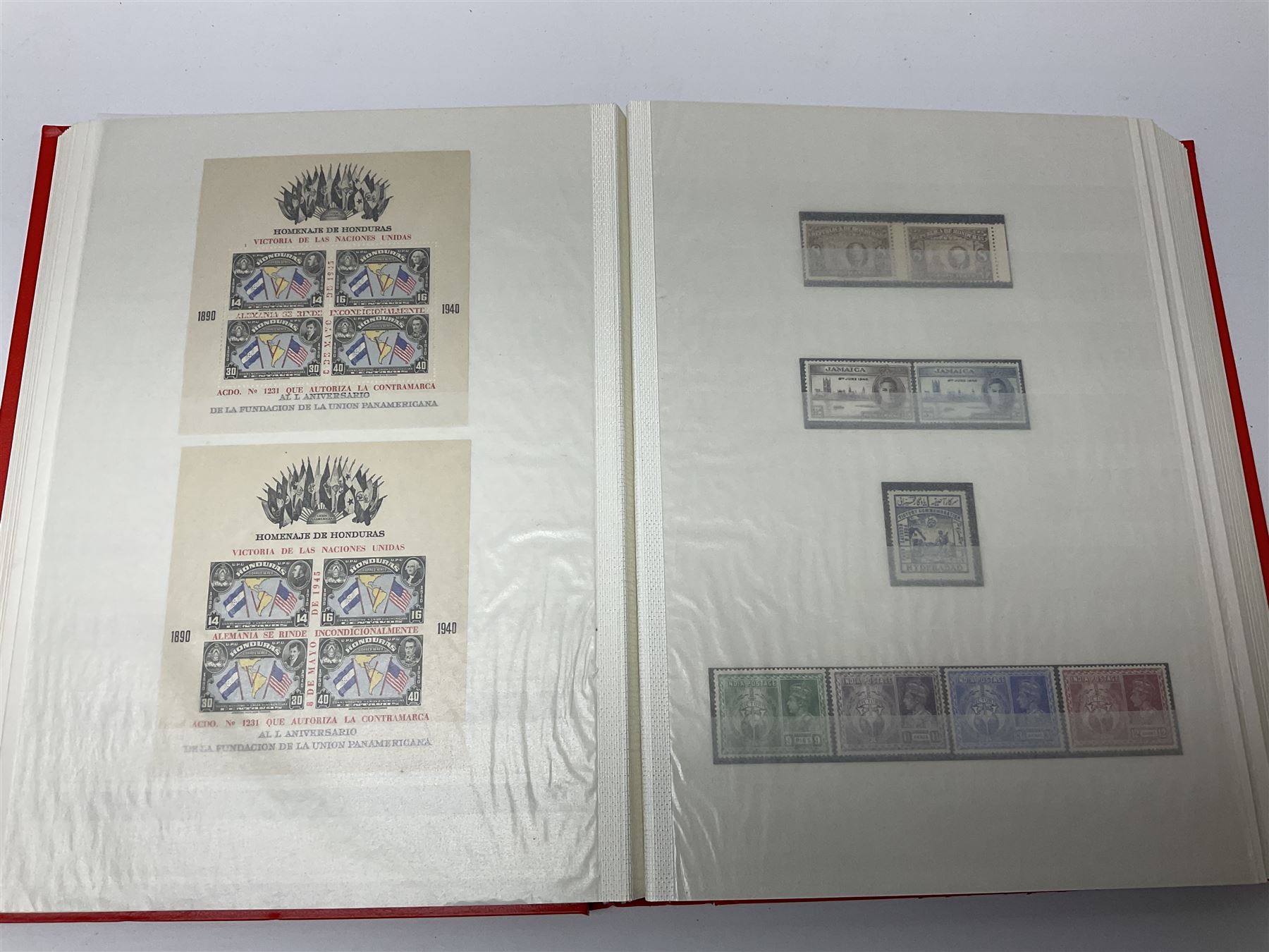 World stamps with many relating to Victory in Europe including King George VI '8th June 1946' stamps from various countries including Antigua, British Guiana, British Honduras, British Solomon Islands, Cayman Islands, Ceylon, Fiji, Grenada, Montserrat, St Helena etc, both mint and used stamps seen, housed in three stockbooks
