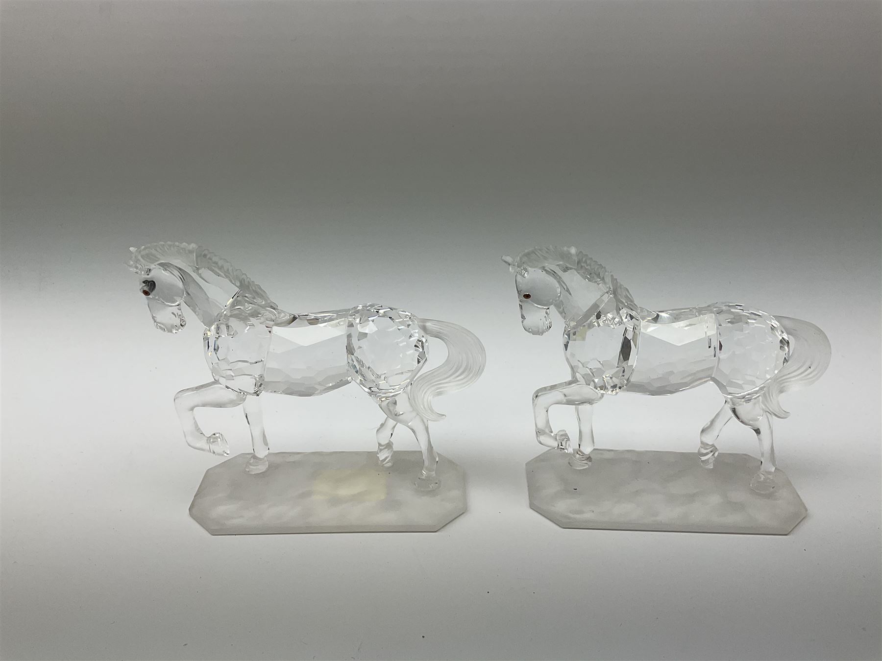 A pair of Swarovski Crystal horses H9.5cm, in original boxes
