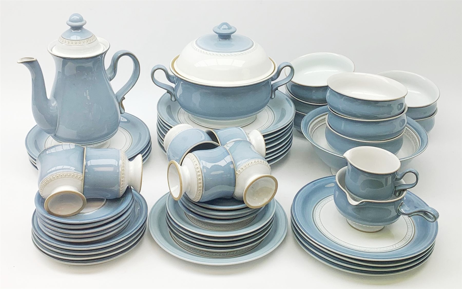 Denby Castile dinner service comprising of eight plates, nine side plates, eight tea plates, eight bowls, six teacups, nine saucers, milk jug, coffee pot, sauce jug, and two large serving bowls
